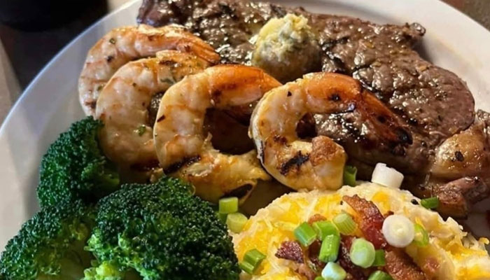 The 208 Bar & Grill Specials: Grilled shrimp, steak, broccoli, and loaded mashed potatoes.